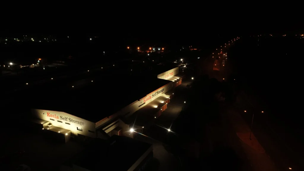 Illuminated commercial signage at night with no light spill onto the adjacent roadway
